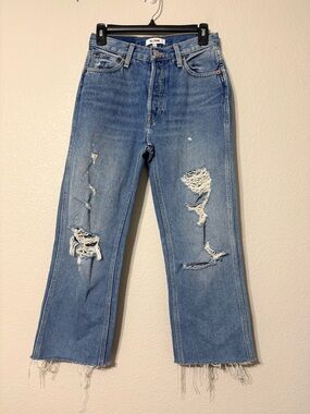 Re/Done Distressed 90’s High Rise Loose Jeans in Light Blue Soft Aged Denim